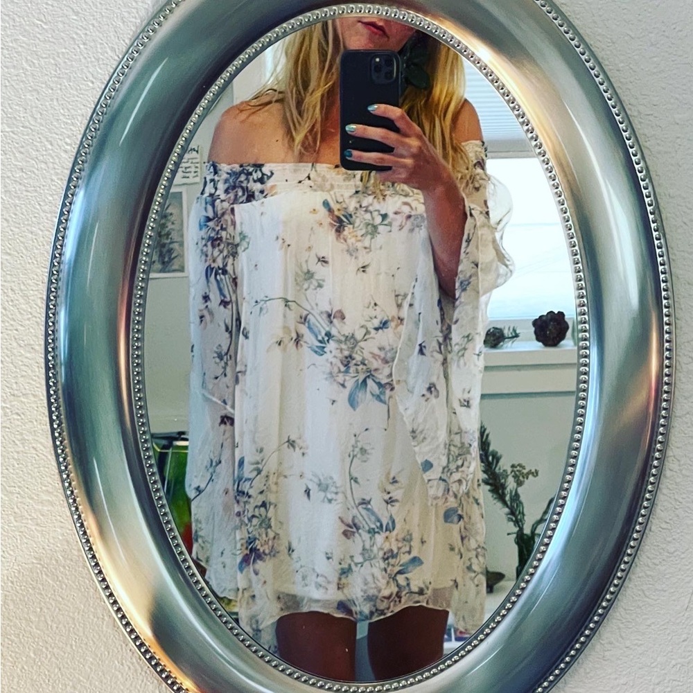 It’s the sheer bell sleeves for me